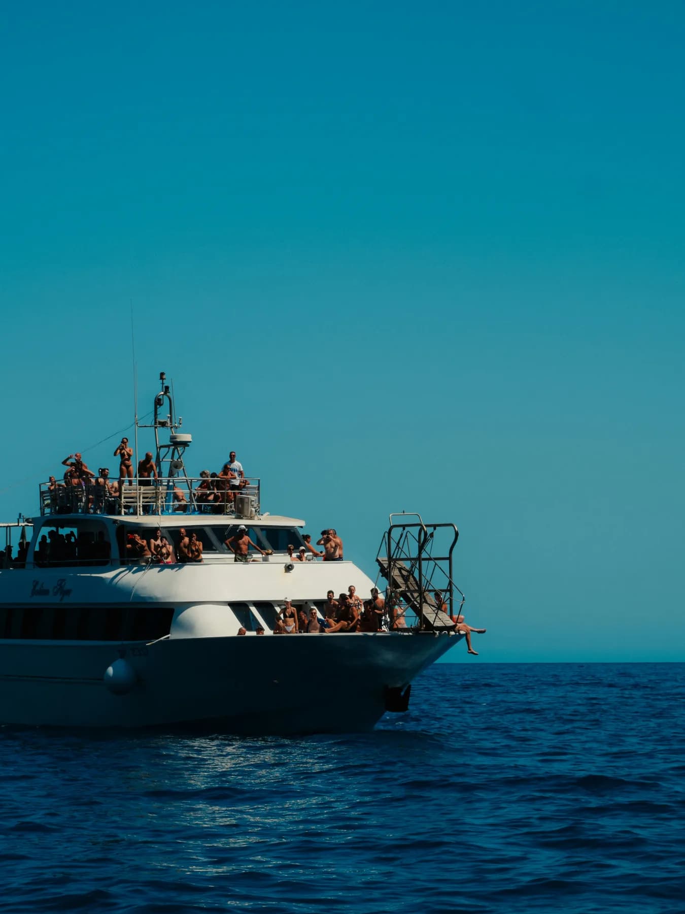 Motor yacht under way off the coast