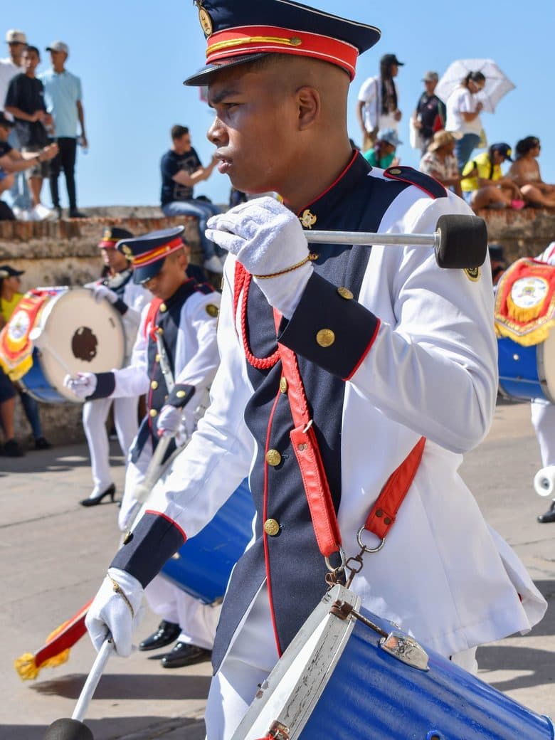 Marching band drummer during an island parade
